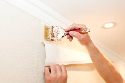 Pose de papier peint au Claux — revêtements muraux et toiles de verre